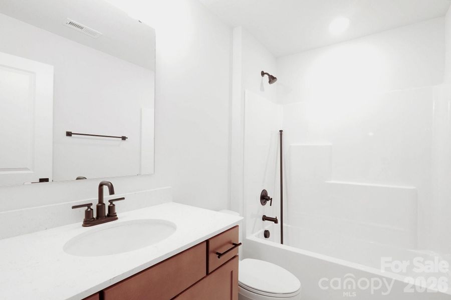 Furnished interior view inside a new home in Sylvan Creek, Denver (Image 9).
