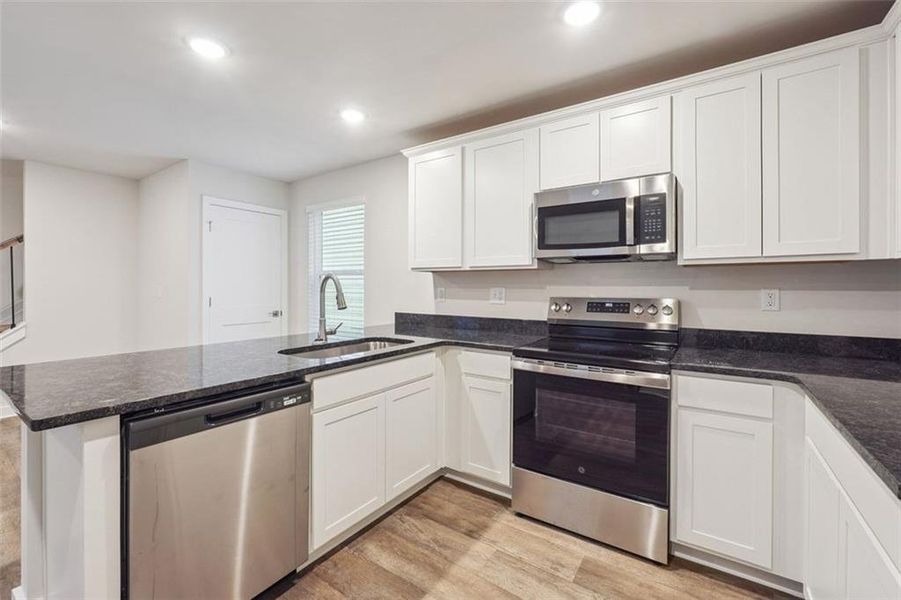 Furnished interior view inside a new home in The Enclave at Stonewall Station, Union City (Image 2).