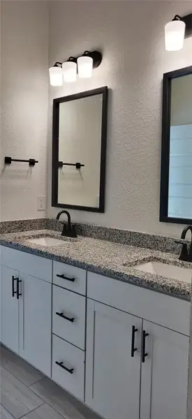 Furnished interior view inside a new home in Sunset Landing, Spring Hill (Image 4).