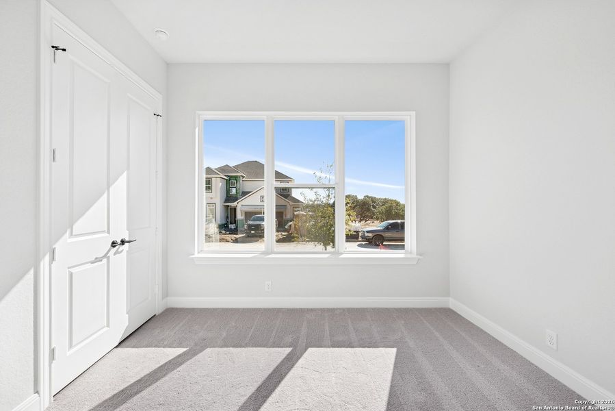 Spacious, unfurnished interior of a new home in Windsong - Legacy Series, Boerne (Image 28).