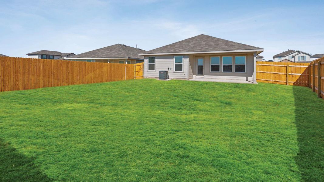 Exterior details and patio area of a home in Prairie Lakes, Buda (Image 22).