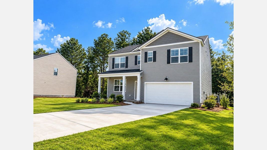 Front exterior of a new home in Cypress Landing, Hardeeville, SC, highlighting curb appeal (Image 2). Front exterior of a new home in Cypress Landing, Hardeeville, SC, highlighting curb appeal (Image 2).