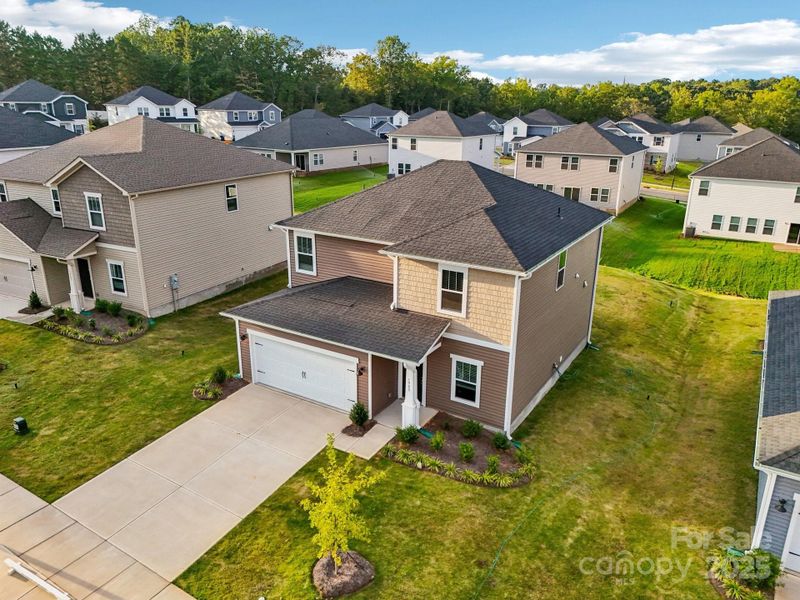 Front exterior of a new home in Harper Landing, Stanley, NC, highlighting curb appeal (Image 2).
