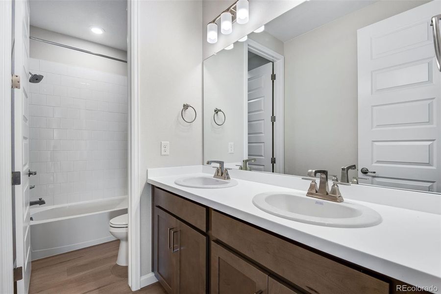 Furnished interior view inside a new home in Ensemble at The Aurora Highlands, Aurora (Image 3).
