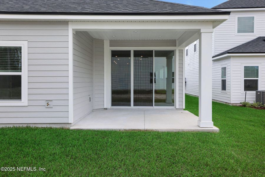 Exterior details and patio area of a home in Brook Forest, St. Augustine (Image 3).