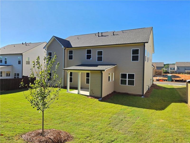 Exterior details and patio area of a home in Enclave at Logan Point, Loganville (Image 27). Exterior details and patio area of a home in Enclave at Logan Point, Loganville (Image 27).