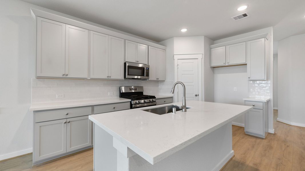 Furnished interior view inside a new home in Mostyn Springs, Magnolia (Image 11).