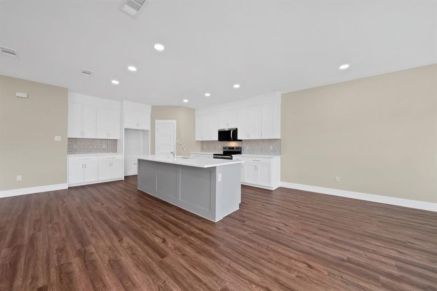 Furnished interior view inside a new home in , The Colony (Image 11).
