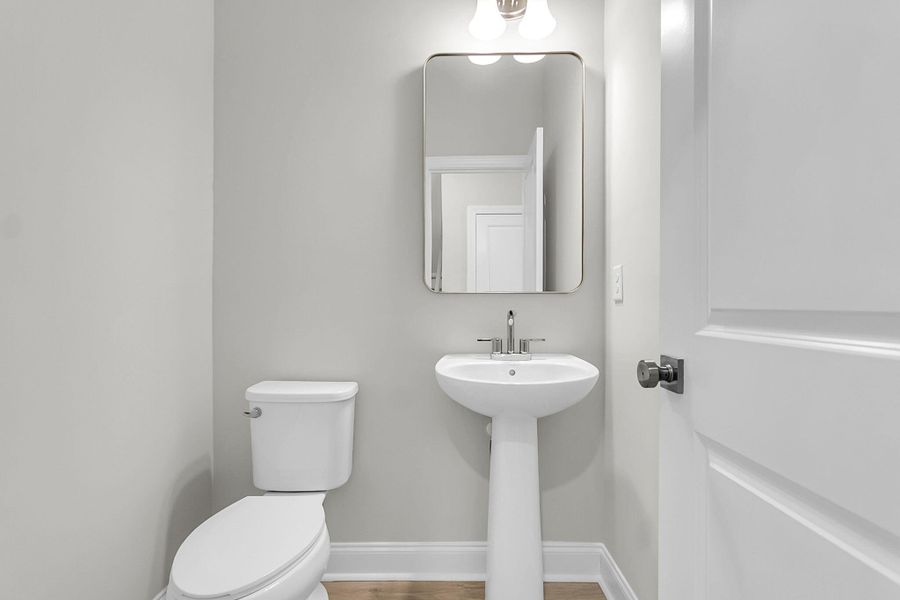 Furnished interior view inside a new home in Tidewater at Lakes of Cane Bay, Summerville (Image 12).