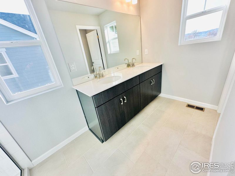 Primary bathroom with double sinks