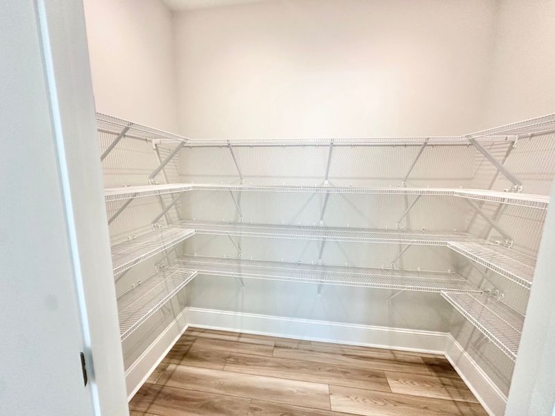 Spacious, unfurnished interior of a new home in Del Webb Wilmington at Mallory Creek, Leland (Image 15).