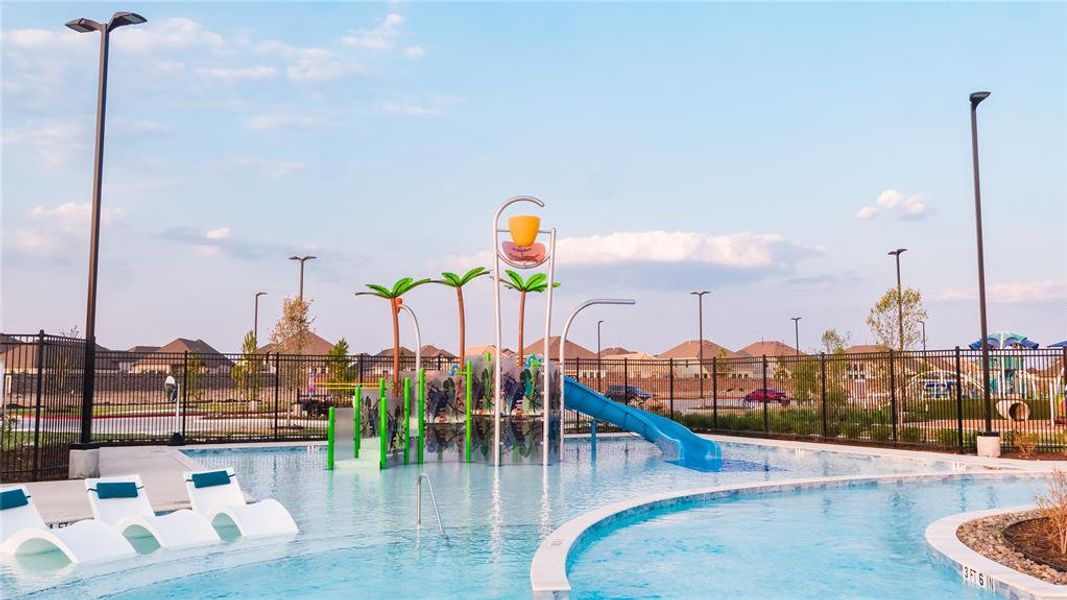 Lounge nearby while the kids play at the water playground.