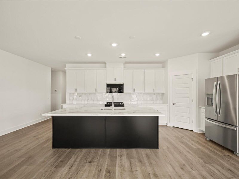 Furnished interior view inside a new home in The Coves at Lakes of Cane Bay II, Summerville (Image 15).