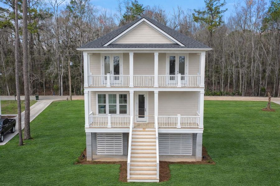 Front exterior of a new home in , Moncks Corner, SC, highlighting curb appeal (Image 14).