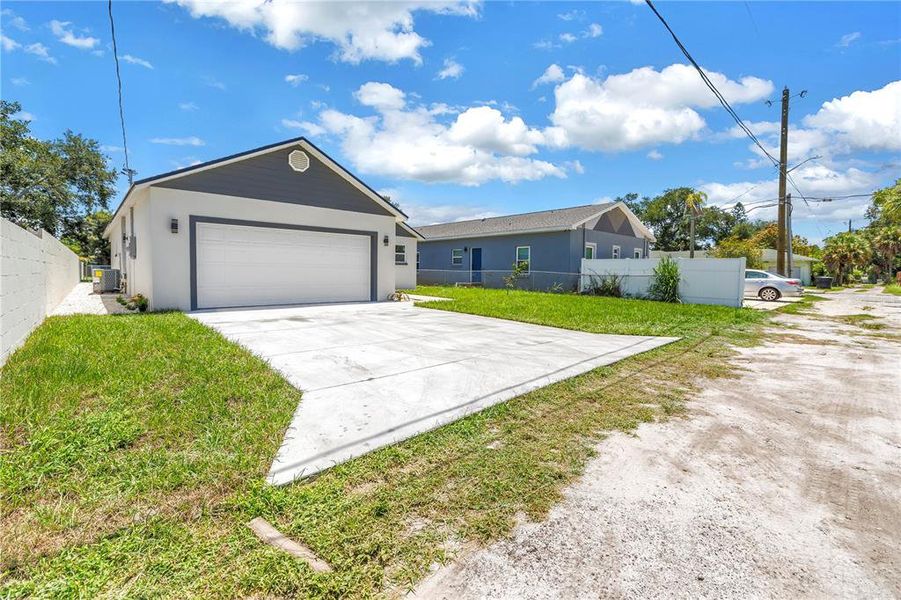 Front exterior of a new home in , St. Petersburg, FL, highlighting curb appeal (Image 17).