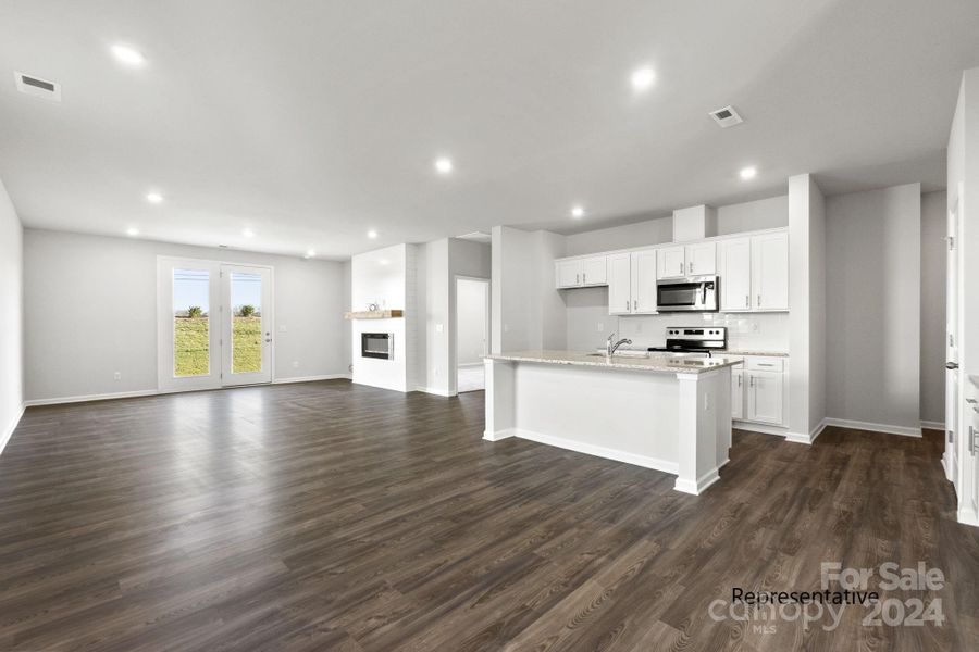 Open floor plan with lots of natural lighting