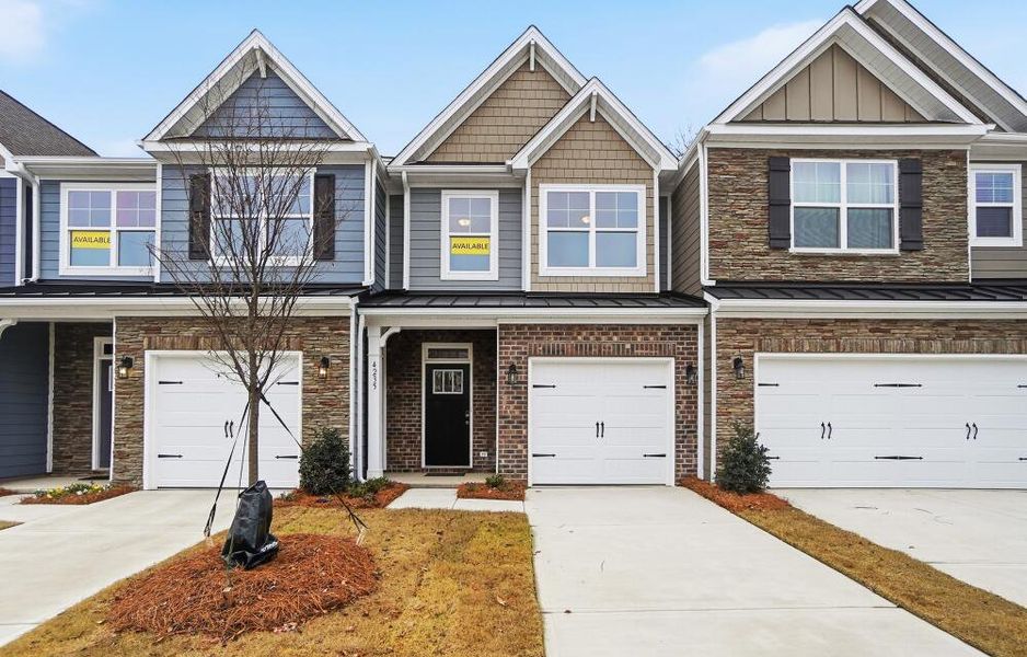 Front exterior of a new home in Harrisburg Village Townhomes, Harrisburg, NC, highlighting curb appeal (Image 2).
