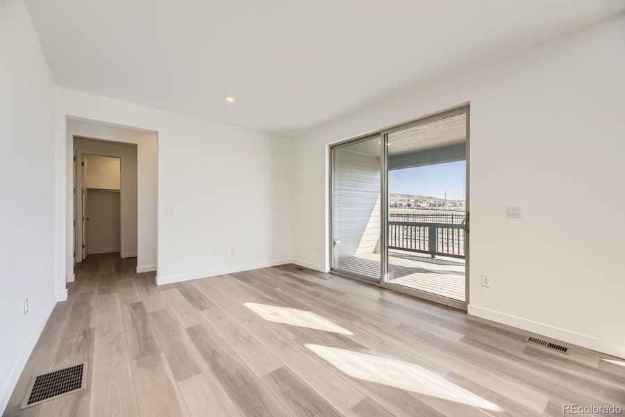 Spacious, unfurnished interior of a new home in Red Rocks Ranch: The Grand Collection, Morrison (Image 7).