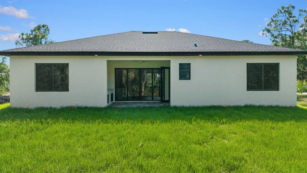 Exterior details and patio area of a home in , Port Charlotte (Image 4).