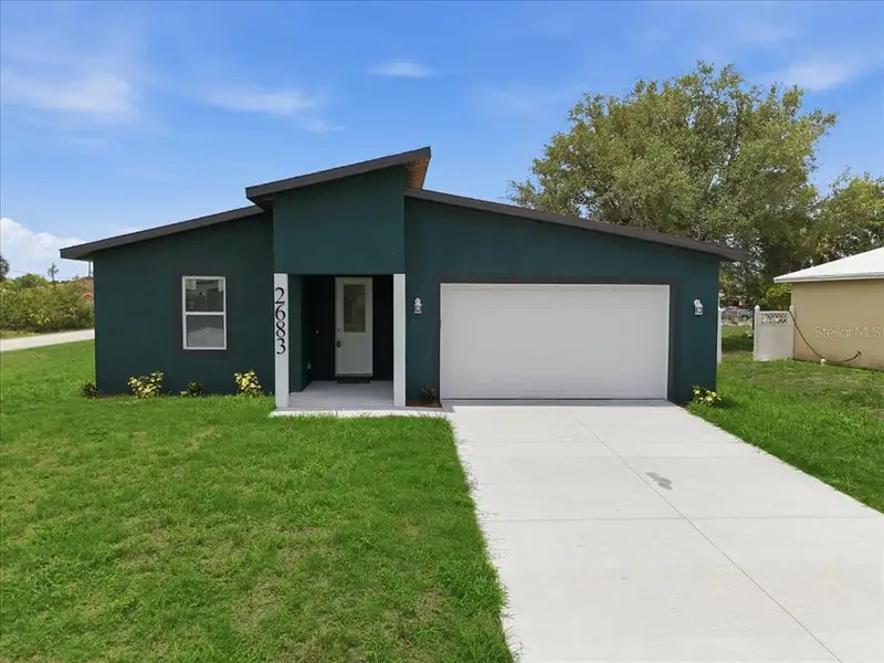 Front exterior of a new home in , North Port, FL, highlighting curb appeal (Image 26).