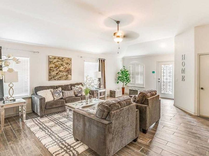 Representative furnished interior of a home built from the Valerie 1371 SSC by Saratoga Homes in Crossland, El Paso (Image 5).