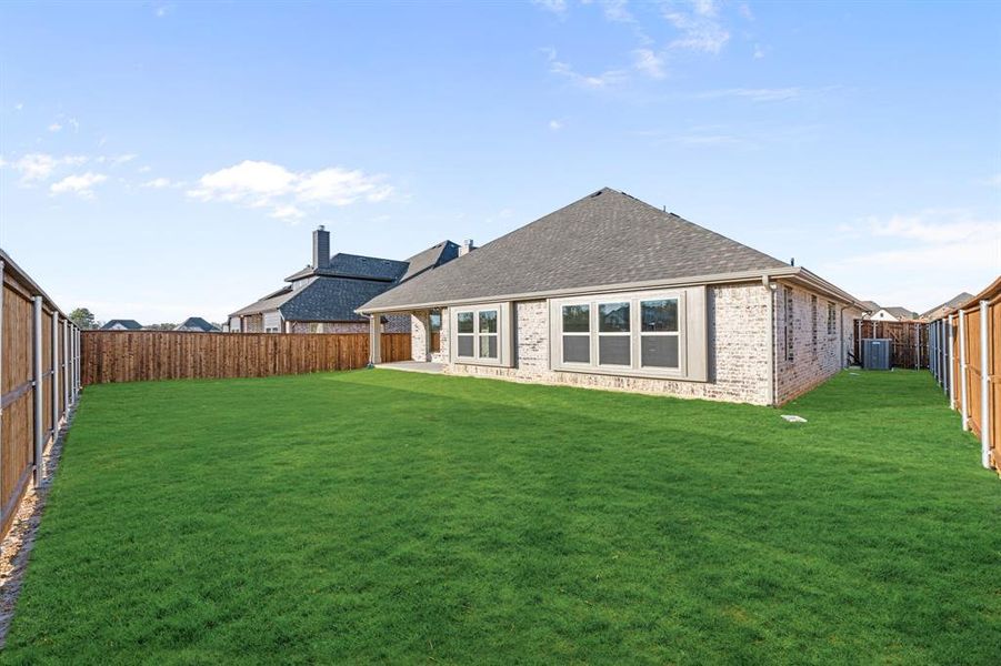 Exterior details and patio area of a home in Mockingbird Hills 60-65, Joshua (Image 27).