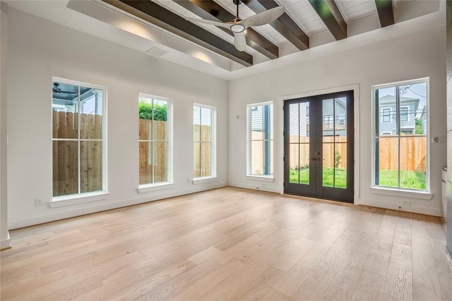 Incredible wood beams span this entire living room.