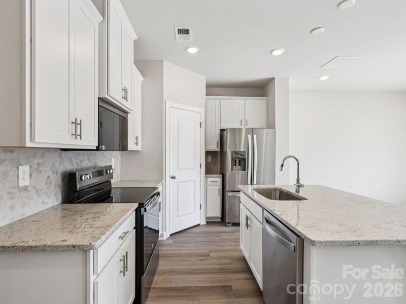 Photo is not of the actual home, but is an inspirational photo of builder’s model home and may depict options, furnishings, and/or decorator features that are not included