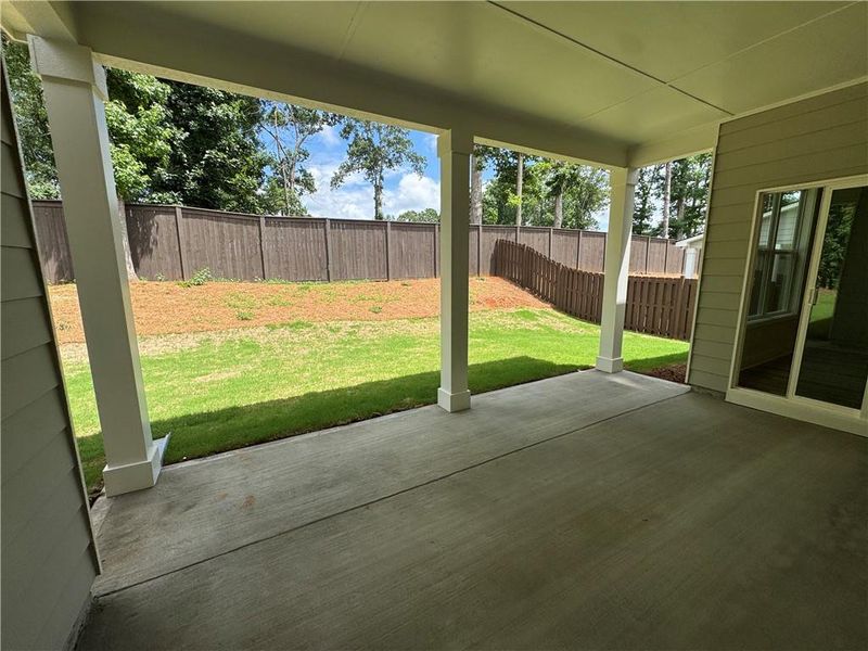 Exterior details and patio area of a home in Rosewood Lake Preserve, Hoschton (Image 18).