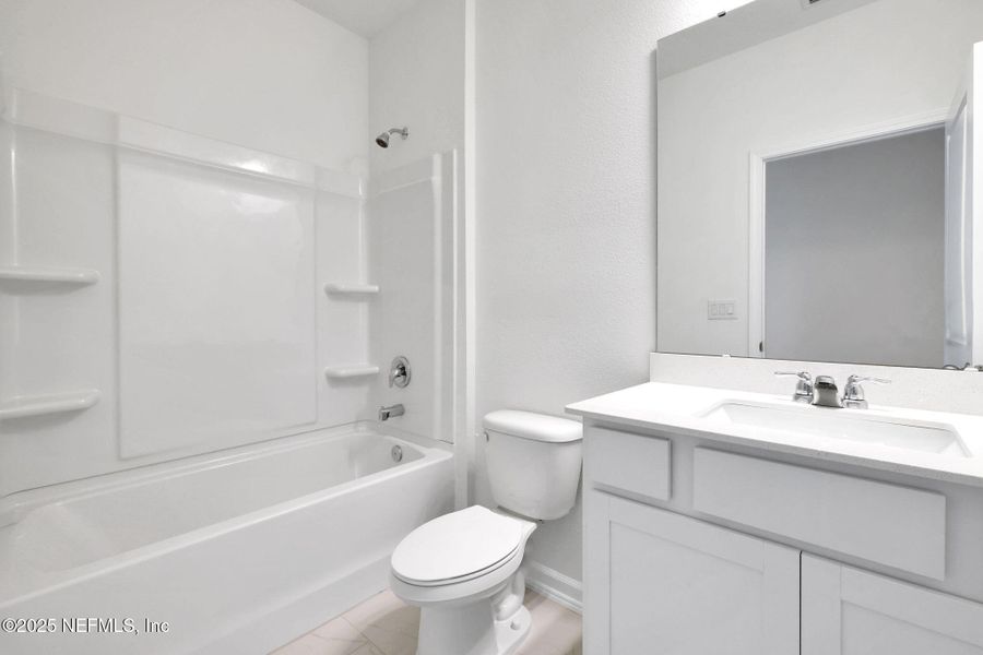 Furnished interior view inside a new home in Cordova Palms, St. Augustine (Image 7).