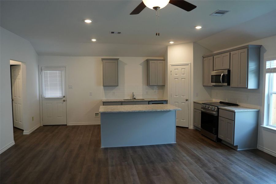 Furnished interior view inside a new home in , Conroe (Image 3).