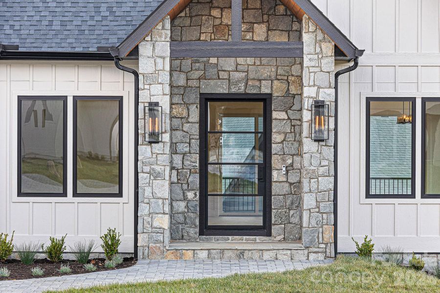 Exterior details and patio area of a home in , Fletcher (Image 30).