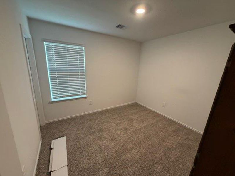 Spacious, unfurnished interior of a new home in The Canopies, Splendora (Image 16).
