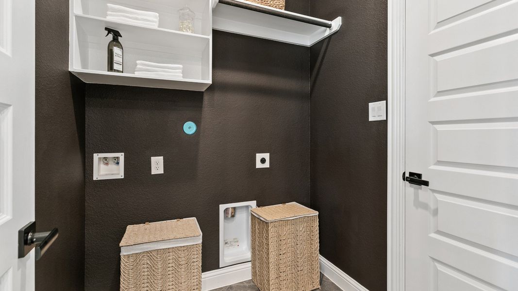 Representative furnished interior of a home built from the Mimosa by Brightland Homes in Sunterra, Katy (Image 17).