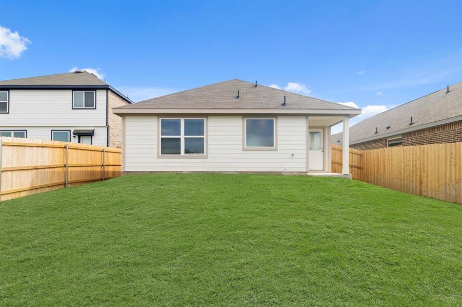 Exterior details and patio area of a home in Christian Meadows, Ennis (Image 2). Exterior details and patio area of a home in Christian Meadows, Ennis (Image 2).