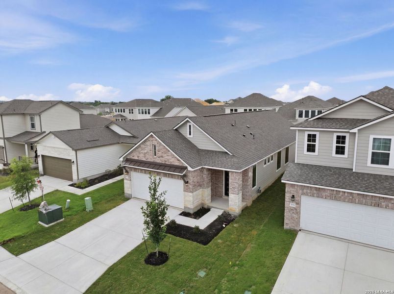 Front exterior of a new home in Talley Fields, San Antonio, TX, highlighting curb appeal (Image 24).