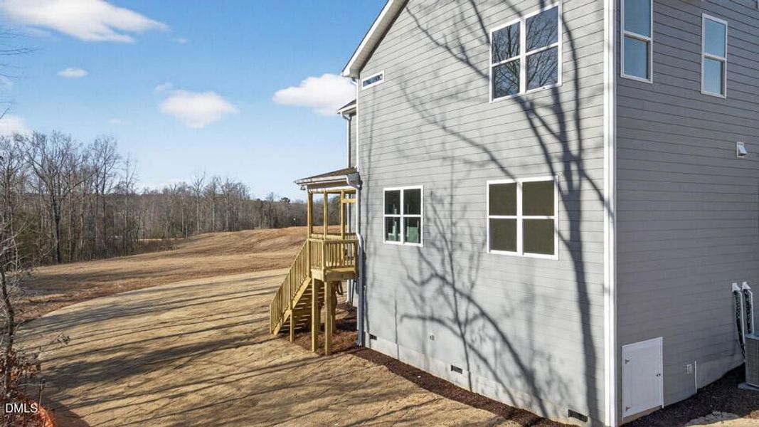 Exterior details and patio area of a home in The Manors at Winston Pointe, Clayton (Image 18).
