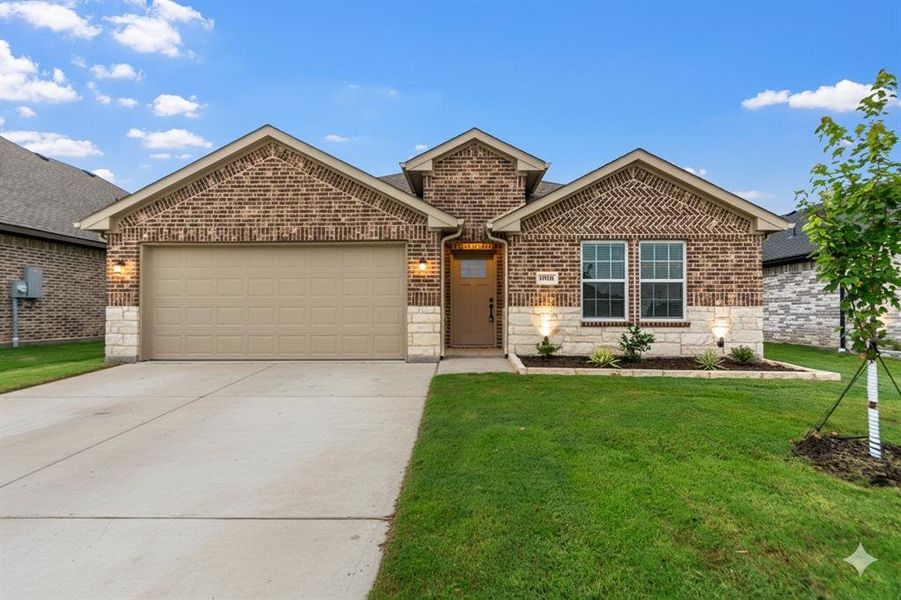 Front exterior of a new home in , Greenville, TX, highlighting curb appeal (Image 19). Front exterior of a new home in , Greenville, TX, highlighting curb appeal (Image 19).