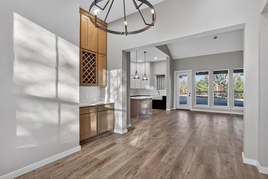 This view from the dining rooms looks towards the living area and back of home.