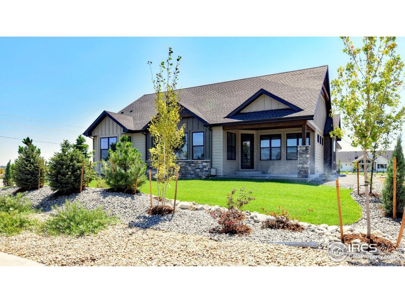 Front exterior of a new home in , Berthoud, CO, highlighting curb appeal (Image 26).