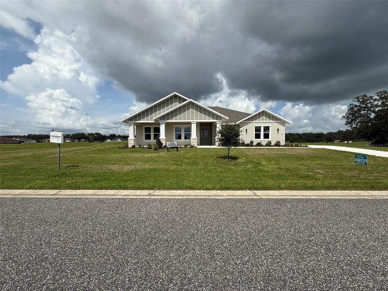 Front exterior of a new home in , Ocala, FL, highlighting curb appeal (Image 1).