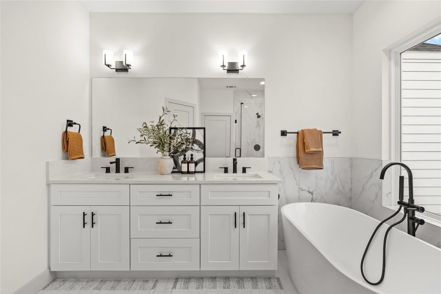 Primary Bath – Previous work by the builder in the community, not representation of exact unit listed. Primary Bath – Previous work by the builder in the community, not representation of exact unit listed.
