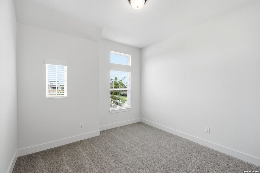 Spacious, unfurnished interior of a new home in The Reserve at Potranco Oaks, Castroville (Image 28).