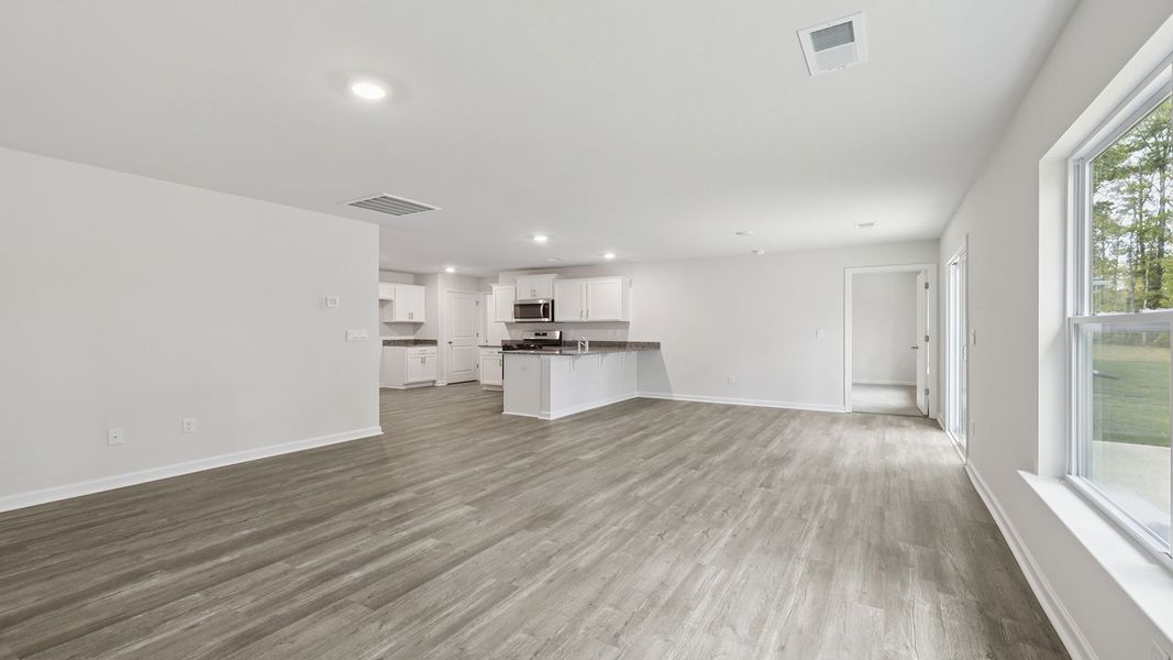 Spacious, unfurnished interior of a new home in Bentley Park, Greenwood (Image 20).