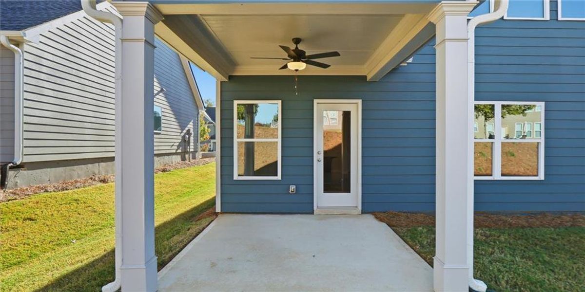 Exterior details and patio area of a home in Traditions of Braselton, Jefferson (Image 20).