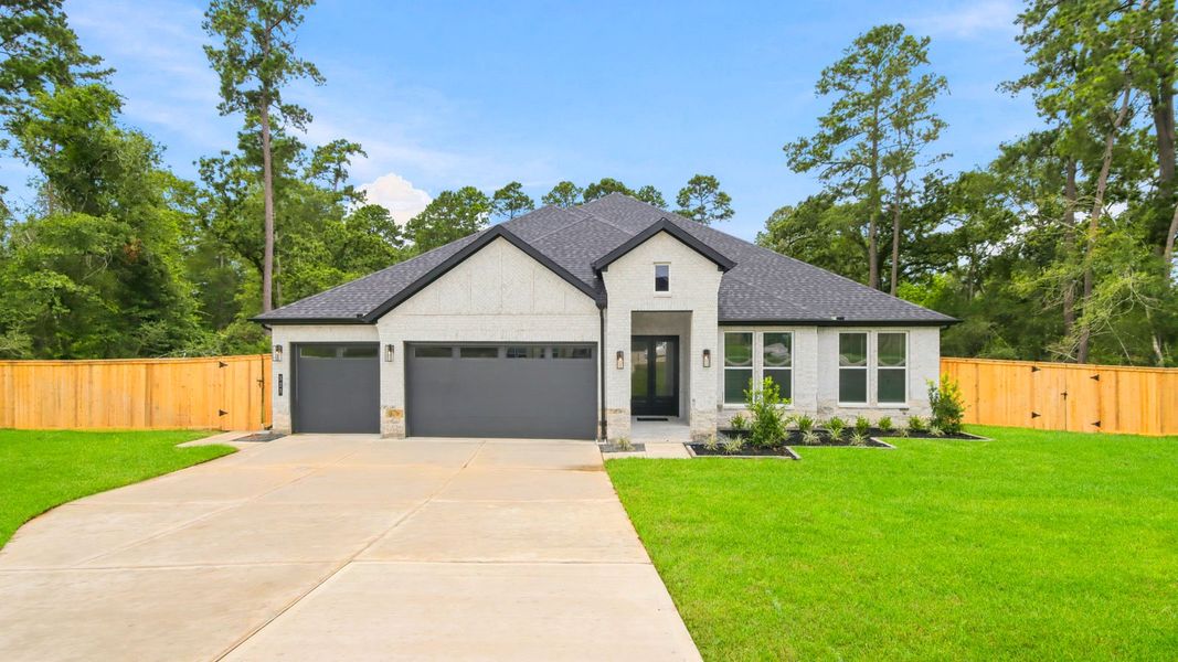 Representative exterior photo of a completed home built from the Amalfi by D.R. Horton in Butlers Bend Estates, Pinehurst, TX (Image 24).
