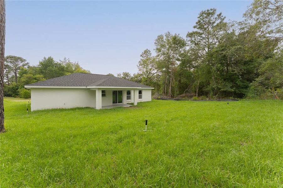 Exterior details and patio area of a home in , Citrus Springs (Image 23).