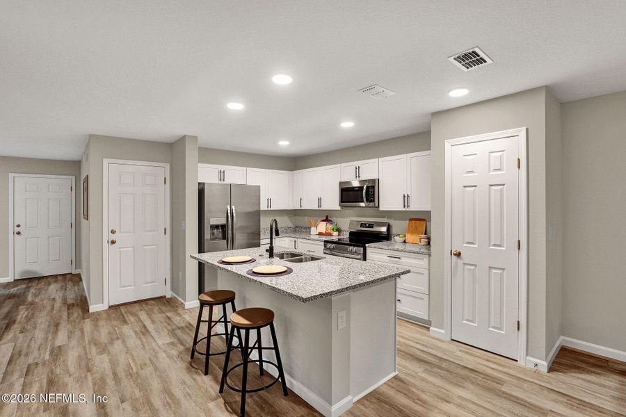Furnished interior view inside a new home in , Jacksonville (Image 13). Furnished interior view inside a new home in , Jacksonville (Image 13).