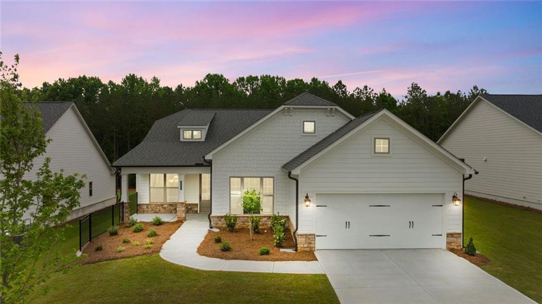 Front exterior of a new home in Soleil Belmont Park, Canton, GA, highlighting curb appeal (Image 4). Front exterior of a new home in Soleil Belmont Park, Canton, GA, highlighting curb appeal (Image 4).
