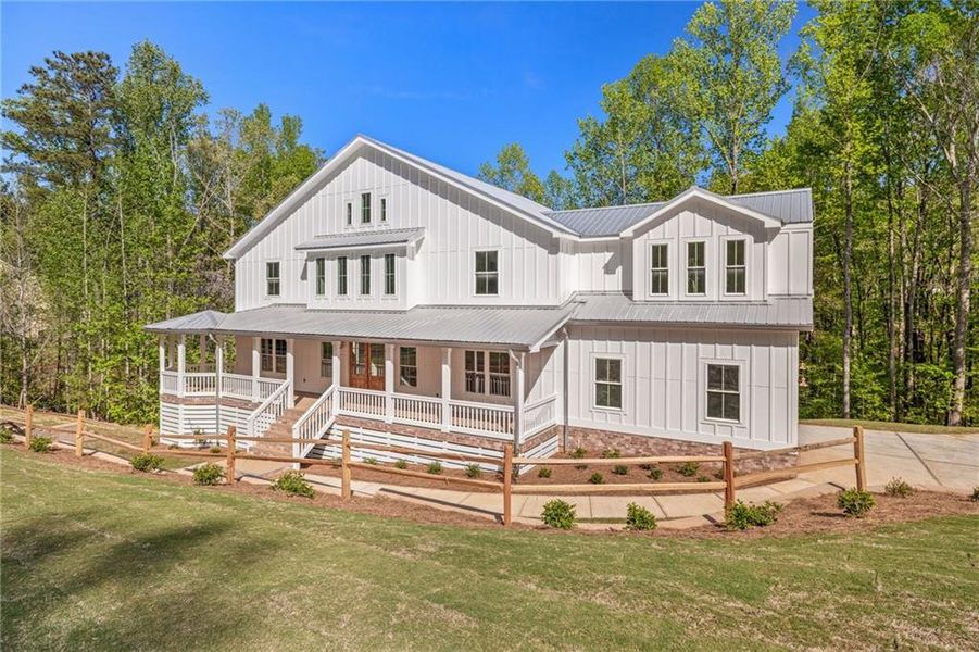 Front exterior of a new home in , Flowery Branch, GA, highlighting curb appeal (Image 27).
